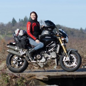 Lauren Trantham of Ride My Road on her Ducati Monster equipped with Giant Loop's Rogue Dry Bag, Pronghorn Straps, Coyote Saddlebag and Fandango Pro Tank Bag